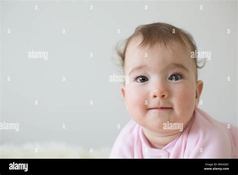 Little Baby With A Happy Face Stock Photo Alamy