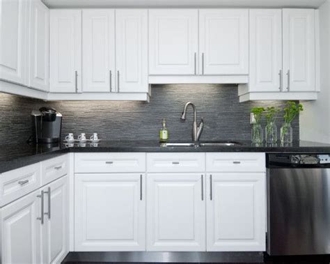One of the more common kitchen ideas for farmhouse design is the use of grey shaker cabinetry. Modern Artistic Condo Applying White and Gray Condo Theme ...
