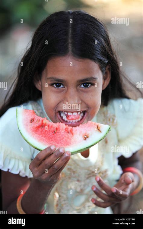 Indian Girl Eating A Slice Watermelon Andhra Pradesh South India Stock