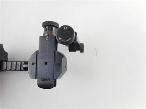 Lyman Rear Peep Sight And Front Blade Sight Switzers Auction