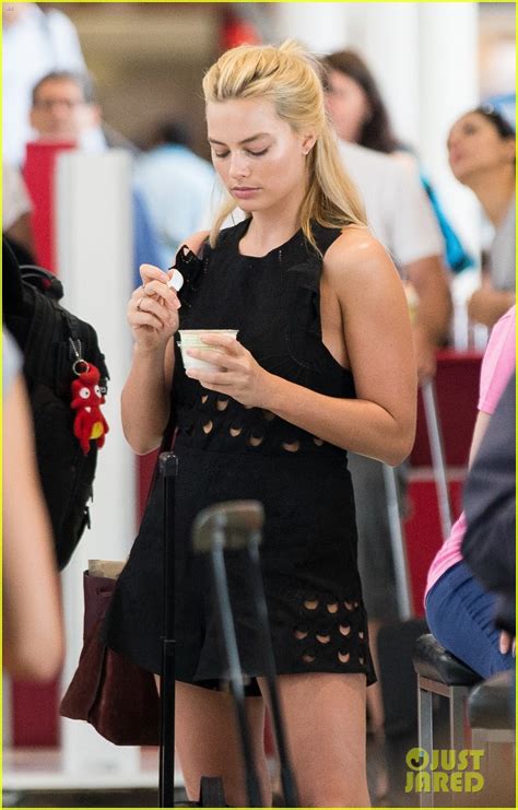Margot Robbie Shows Some Skin In Romper At Sydney Airport Photo