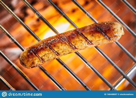 Grilling One Sausage On Barbecue Grill Stock Image Image Of Overhead