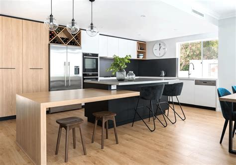 Modern And Co Kitchen With Island Bench And Dropdown Table