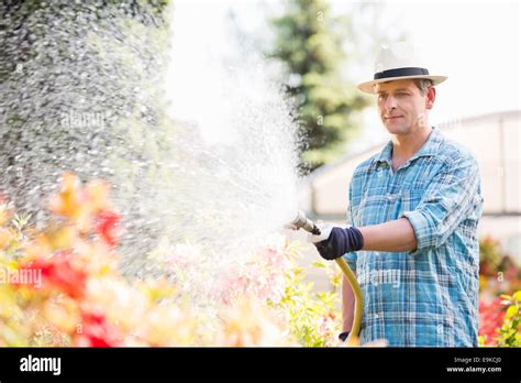 Watering Plants Hi Res Stock Photography And Images Alamy