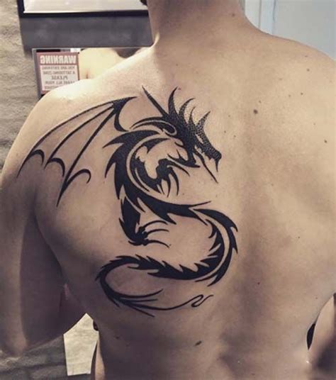Sırta sağdan sola yukardan asagıya yaptırılanı jakuza geleneğidir. tribal dragon tattoo on bak tribal ejderha dövmesi sırt ...
