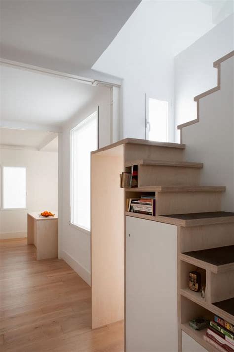This creates more space in the apartment but still makes getting up to the sleeping area easy. Space Saving Stair Storage Design in Plywood