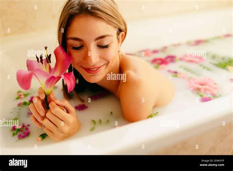 Beautiful Woman Relaxing While Taking Bath At Beauty Spa Stock Photo