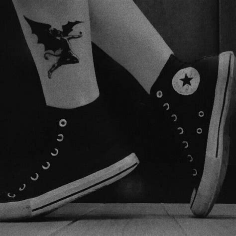 A snake that the head began on his head and went down the length of his body, along a leg to his foot. black sabbath tattoo | Tatuagens inspiradas, Ideias de ...