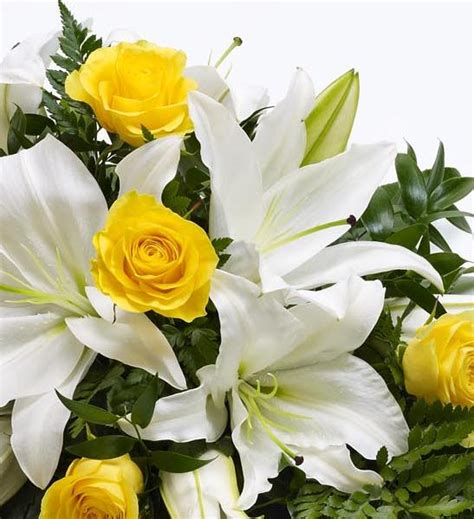 Maybe you would like to learn more about one of these? Rose and Lily Spray - Yellow and White - Funeral Flowers ...