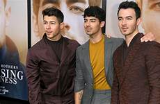 jonas brothers nick kevin putting missing magic family first attend premiere joe left documentary chasing prime amazon npr recapture happiness