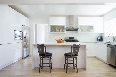A high gloss kitchen is ideal for those looking for a thoroughly modern kitchen design. How to Design the Dream Kitchen: White Gloss Euro Cabinets