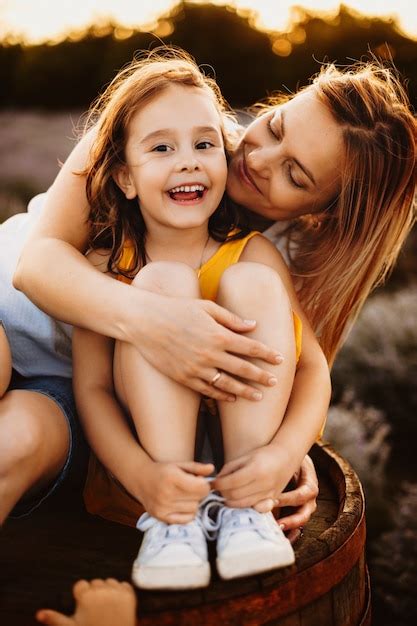 Premium Photo Portrait Of A Lovely Mother And Her Daughter While Girl