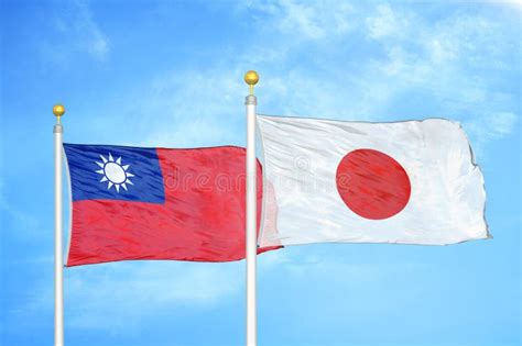 Taiwan And Japan Flags Crossed And Waving Flat Style Official