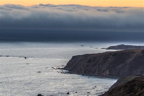 Fog Bank At Sunset Photograph By Marc Crumpler
