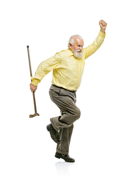 Happy Old Active Bearded Man Jumping With Cane In His Hand Isolated On