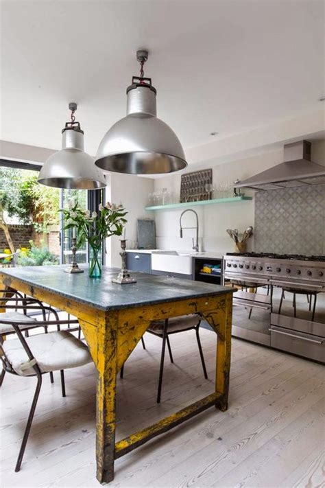 A multipurpose surface, they allow prep work, cooking, eating, working, and entertaining. 25 Industrial Kitchen Islands To Make A Statement - DigsDigs