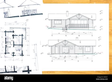 Designers Hand Drawing With House Plan Blueprints Stock Photo Alamy