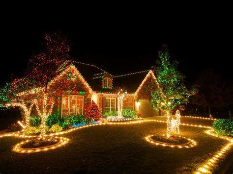Wrap the light string into a ball and begin unraveling as you move up the trunk. How to install safety Christmas lights on outdoor trees ...