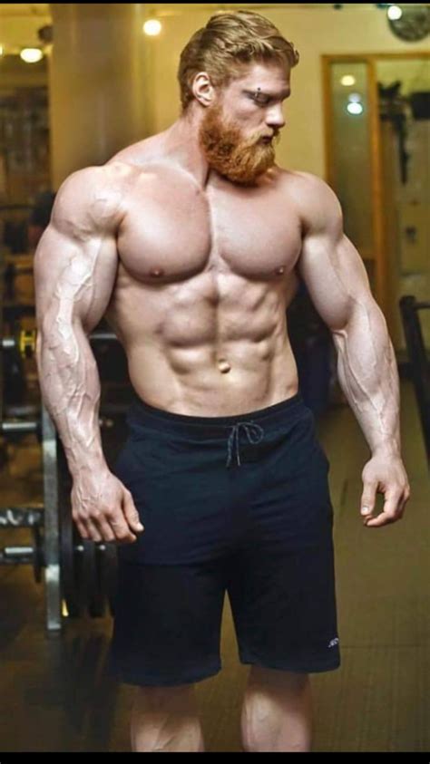 Attractive Redheaded Bodybuilder In The Gym
