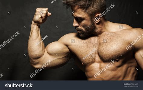 Image Muscular Man Flexing His Biceps Stock Photo 633326807 Shutterstock