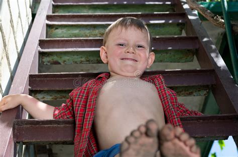 After playing at the beach. Little Boy Showing Off His Dirty Feet Stock Image - Image of outdoors, cute: 35710967