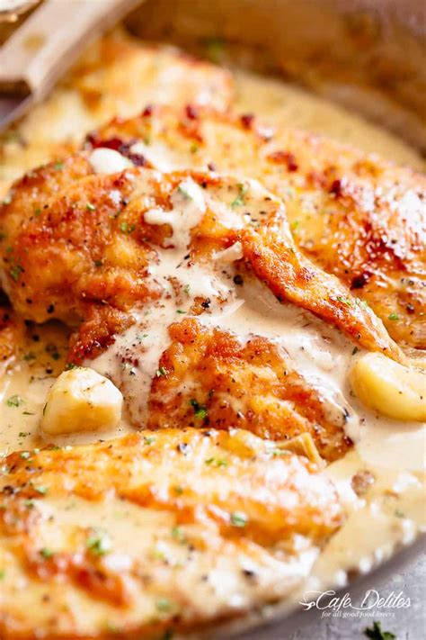 Spinach stuffed chicken breast with artichokes is an easy way to make a cheap staple stand out. creamy garlic chicken breasts - easy recipes