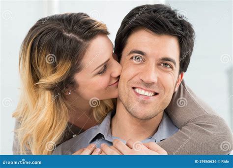Girlfriend Kissing Her Boyfriend Stock Photo Image Of Handsome