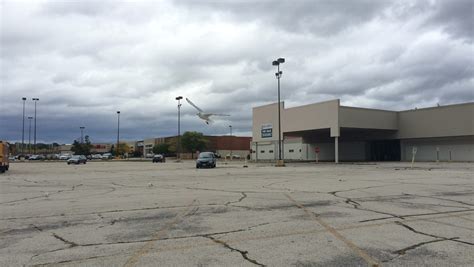 Group to buy, revamp East Town Mall