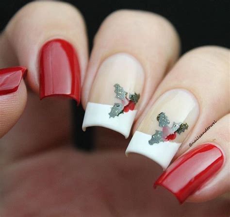 stunning holiday manicure  atnailsandtowel   french tip nail vinyls holly leaf nail
