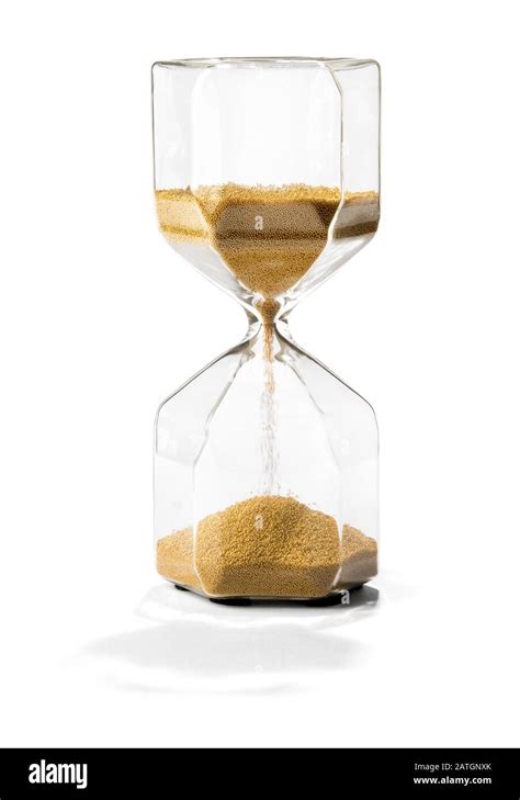 Sand Running Through An Hourglass With Shadow Measuring Passing Time