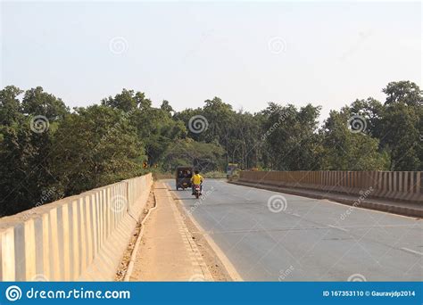 Overbridge And Travelers On Indrawati River Overbridge Editorial Image
