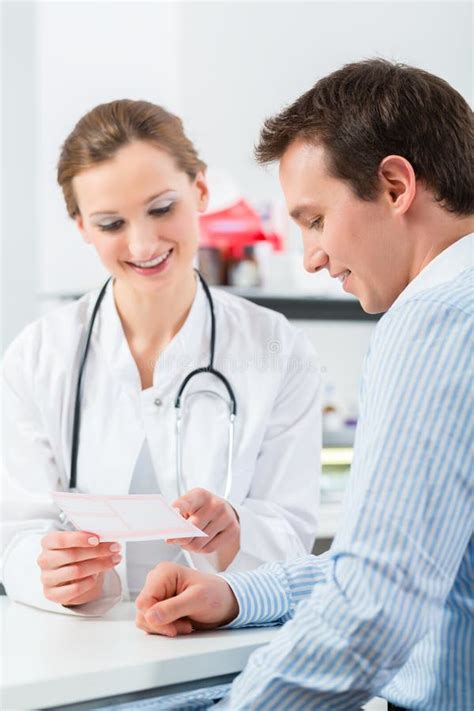 Doctor With Patient In Clinic Consulting Stock Photo Image Of Woman