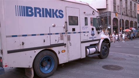 Brinks Security Truck driving through Times Square slow motion Stock Video Footage 00:26 SBV ...
