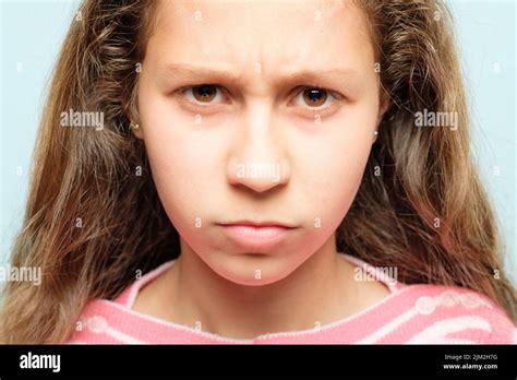 Emotion Face Grumpy Pursed Lips Frowning Child Stock Photo Alamy