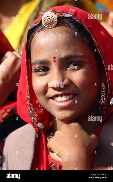 Portrait Of Smiling Indian Girl At Pushkar Camel Fair Stock Photo Alamy