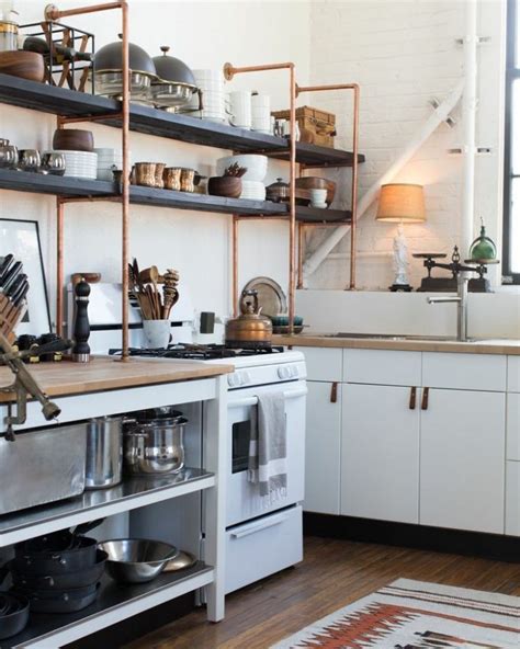 One benefit of using plywood panels when hanging kitchen cabinets is that air can travel freely between the wall and the cabinet, drying potential water or damp. 65 Ideas Of Using Open Kitchen Wall Shelves - Shelterness