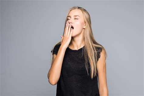 Beautiful Woman Yawns Bored Isolated On Gray Background Alexandre