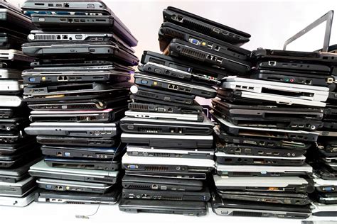 Stack of old, broken and obsolete laptop computer | Healthcare IT Today
