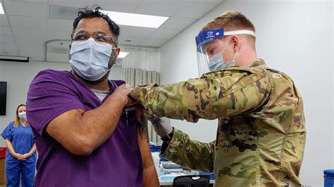 The covid vaccines are creating the dangerous variants that will wipe out the vaccinated sheeple. Fort Bragg administers first Pfizer COVID-19 vaccine