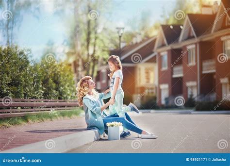 Mother And Daughter Walking On Street Stock Image Image Of Home Hair
