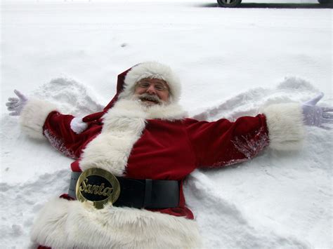 Even Santa Claus Likes To Make A Snow Angel Every Once In A While