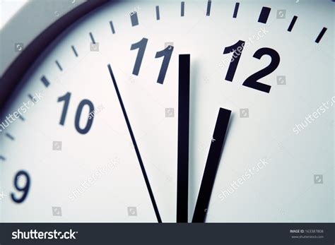 Closeup Of Hands On Clock Face Stock Photo 163387808 Shutterstock