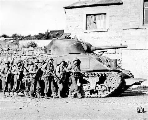 Photo M Sherman Tank Covering The Advance Of Men Of Us Th Infantry