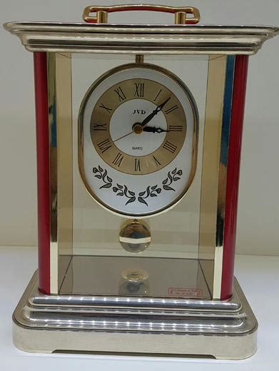 Clock (instrument to measure time). Stolní hodiny JVD hrací melodie - GoldEligius