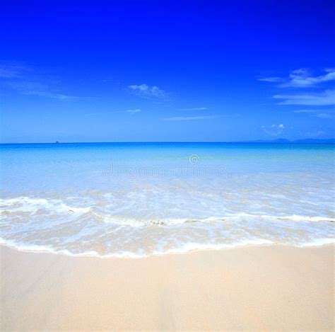 Beautiful Beach With Crystal Clear Blue Water S Against Blue Sky