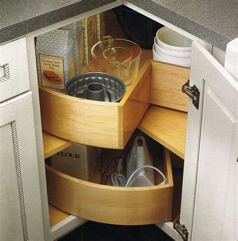 The new lazy susans have 2 wood shelves that spin independently. Kitchen Corner Storage Cabinets