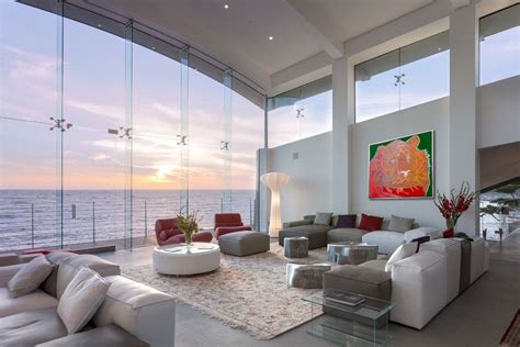 Living Room With Tall Vaulted Ceiling And A Nearly Unobstructed View