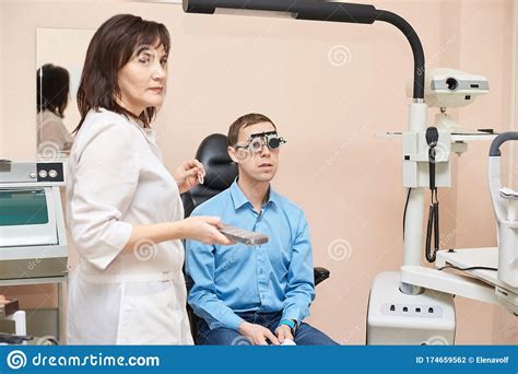 Ophthalmologist Doctor in Exam Optician Laboratory with Male Patient. Men Eye Stock Photo ...