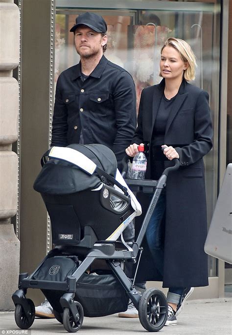 He is barely a year old, but the cherubic son of lara and sam worthington, rocket zot, is already becoming the spitting image of his famous parents. Lara Bingle covers up her post-pregnancy figure in a long ...
