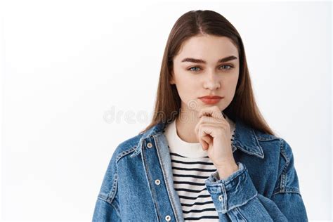 Hmm Interesting Thoughtful Young Brunette Woman Looking At Camera